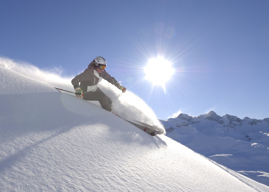 Skiing through the powder on Arlberg